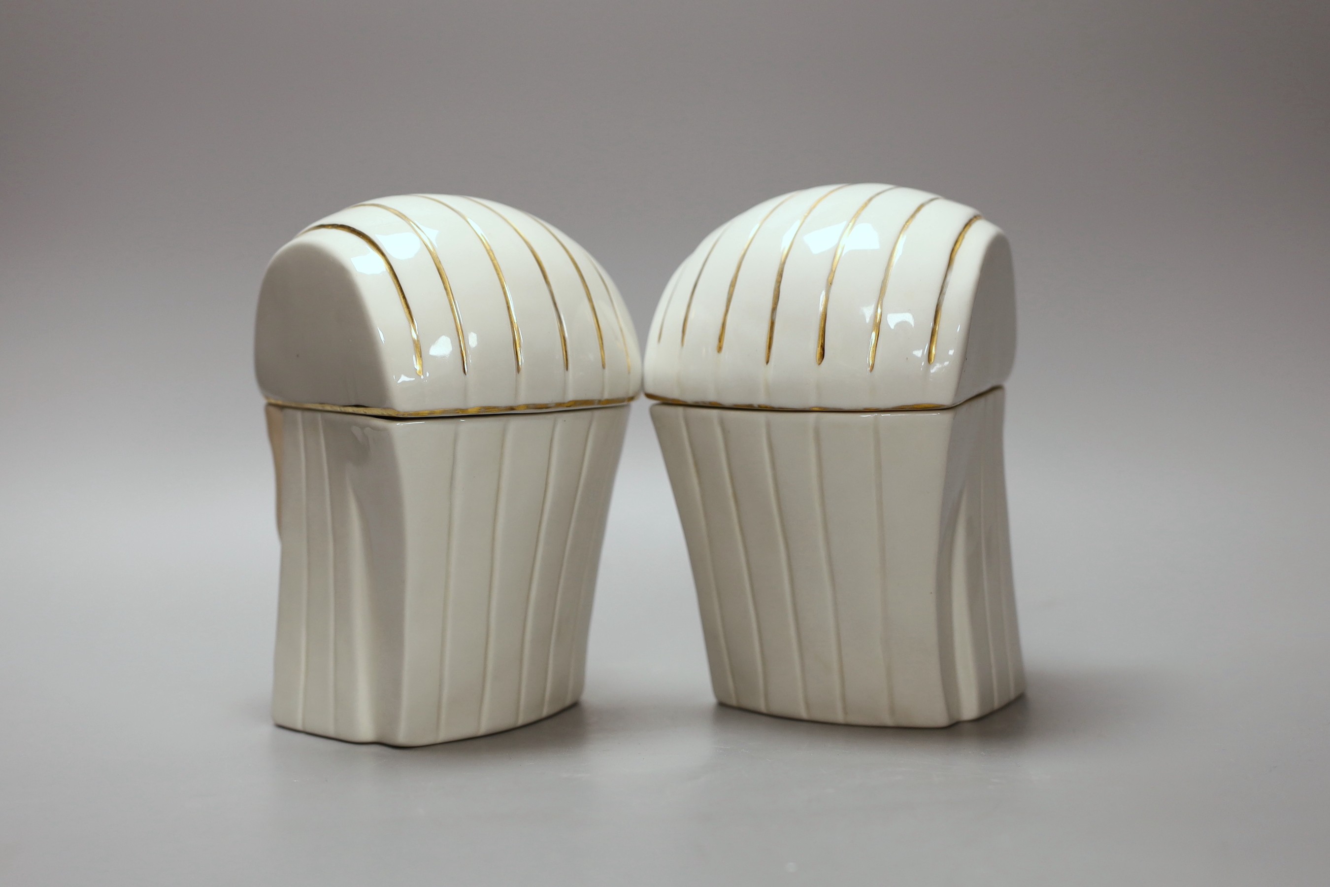 A pair of Robj Art Deco figural bonbonnieres, 17cm